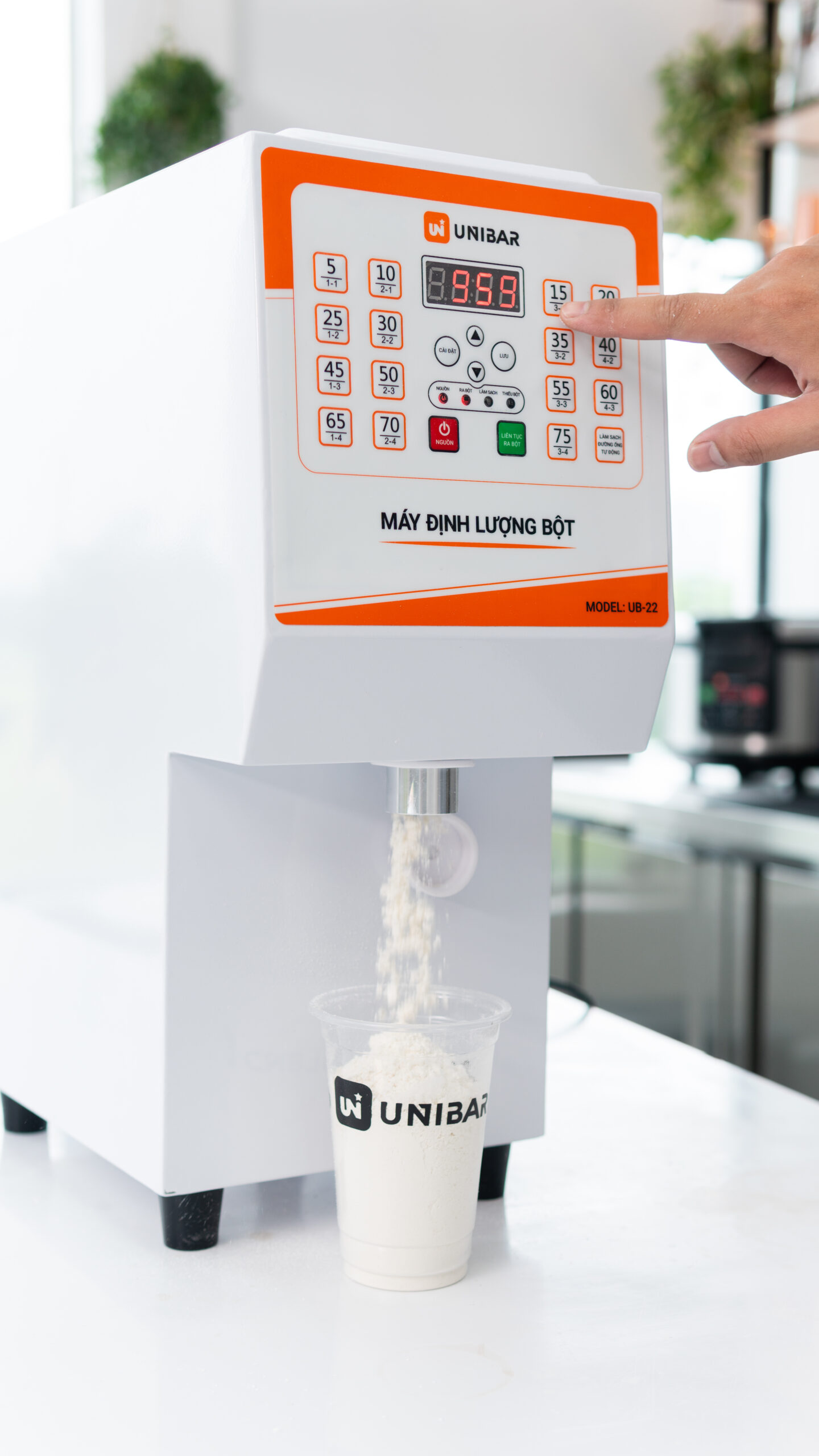 Máy định lượng bột Unibar UB-22